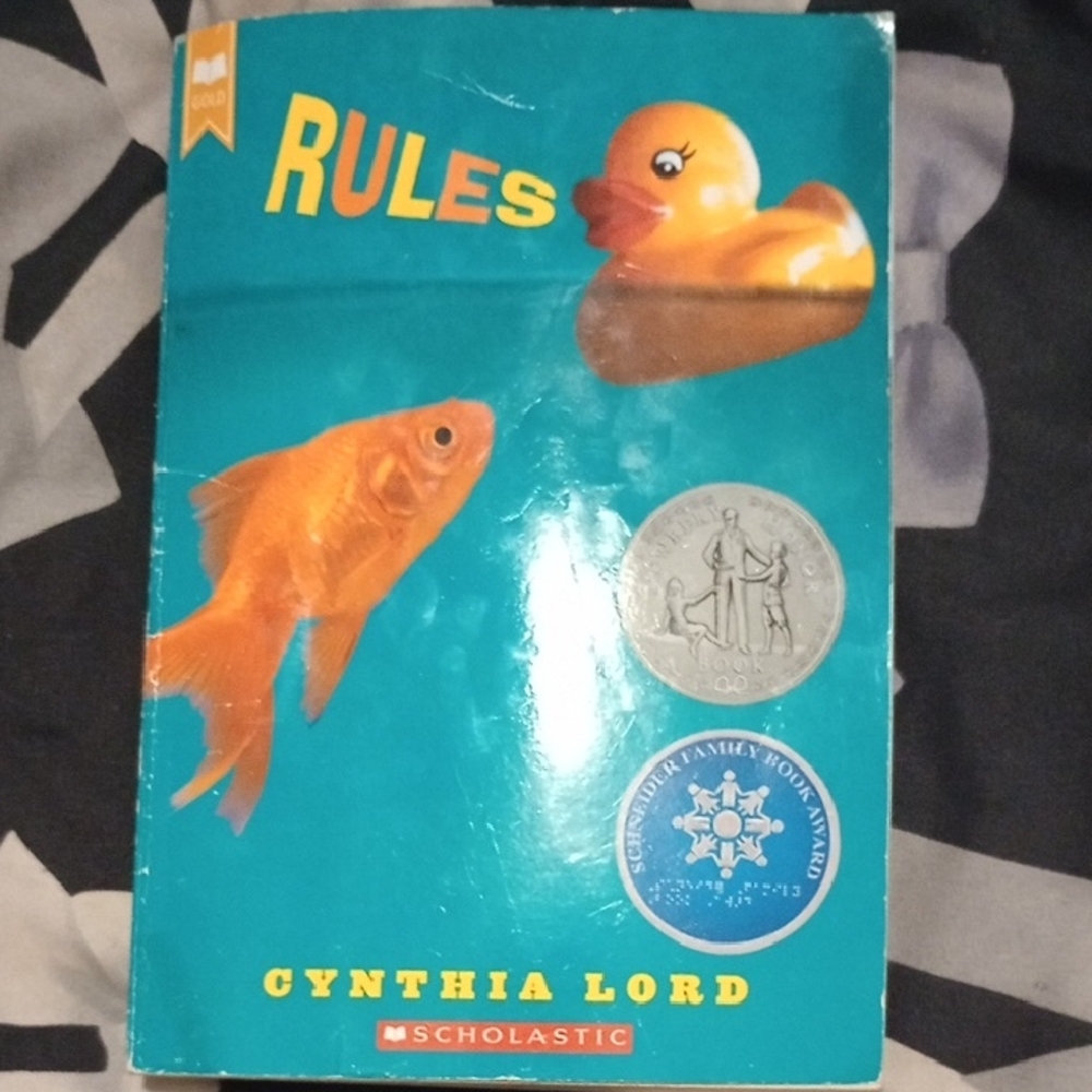 Scholastic 'Rules' Book with Teal and Yellow Cover